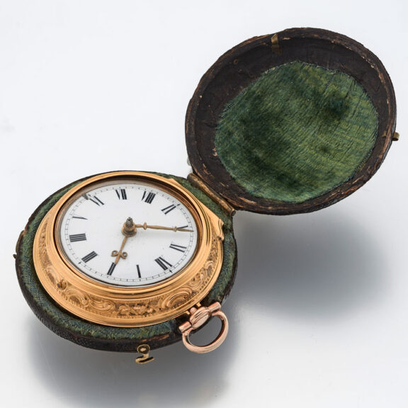 English gold repousse watch with protective outer Circa 1762 English gold repousse watch with protective outer Circa 1762