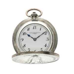 Unusual Swiss silver concealed medallion watch Circa 1922