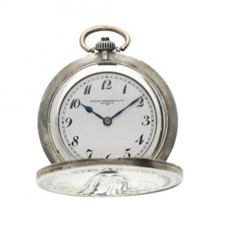 Unusual Swiss silver concealed medallion watch Circa 1922