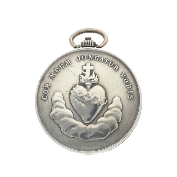 Unusual Swiss silver concealed medallion watch Circa 1922 Unusual Swiss silver concealed medallion watch Circa 1922