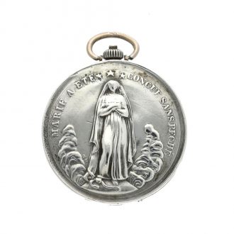 Unusual Swiss silver concealed medallion watch Circa 1922 Unusual Swiss silver concealed medallion watch Circa 1922
