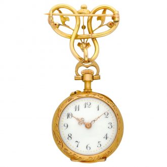Swiss gold and enamel lady's lapel watch with pin Circa 1920
