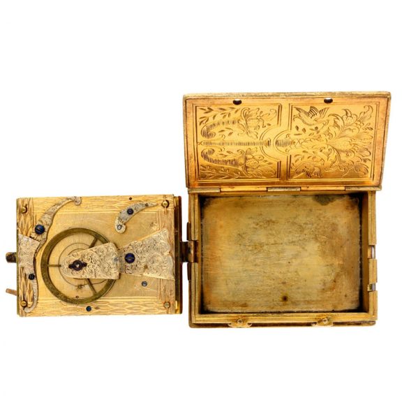 French gilt metal watch made in the form of a book Circa 1850 French gilt metal watch made in the form of a book Circa 1850