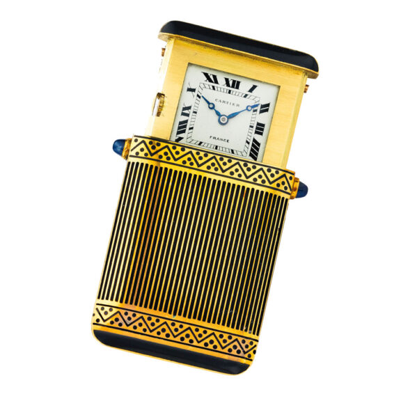 Elegant French gold and enamel concealed travel clock Circa 1925