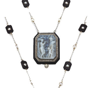 Swiss platinum and black lacquered pearl- and onyx set pendant watch Circa 1925