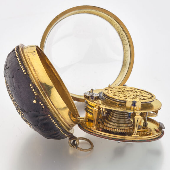 French gilt and leather verge with Egyptian pillars Circa 1690 French gilt and leather verge with Egyptian pillars Circa 1690