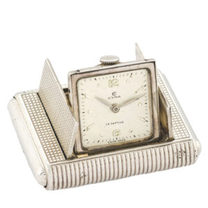 Rare Swiss silver purse watch with shuttered dial Circa 1940