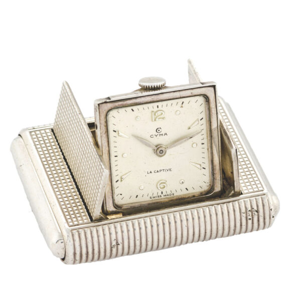 Rare Swiss silver purse watch with shuttered dial Circa 1940