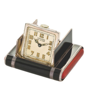 Swiss silver purse watch with concealed shuttered dial Circa 1920