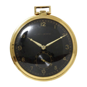 Swiss 18K gold open faced watch with black dial Circa 1935