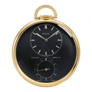Rare Swiss yellow gold watch with black dial Circa 1940