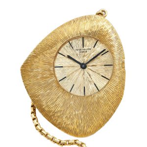 Swiss 18k yellow gold asymetric keyless watch Circa 1964 