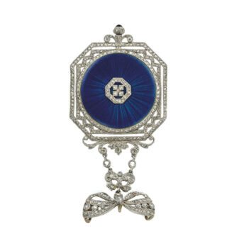 Back centered by a platinum diamond-set hexagonal ornament