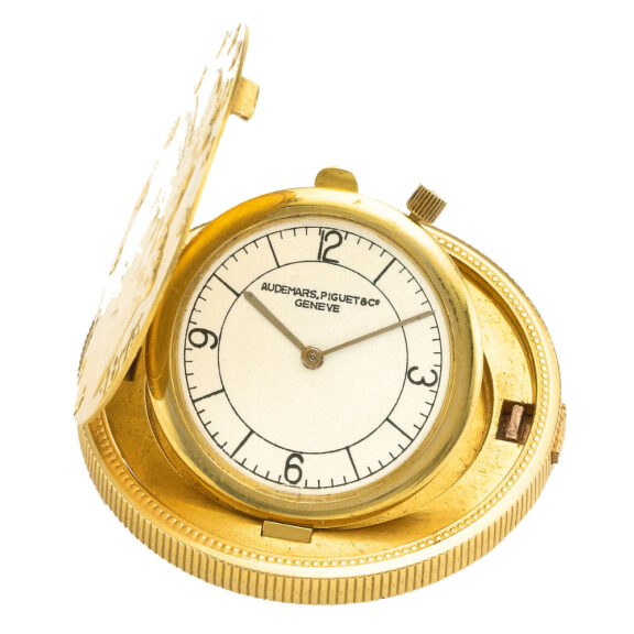 Swiss ultra-thin gold coin form lever watch Circa 1946 Swiss ultra-thin gold coin form lever watch Circa 1946