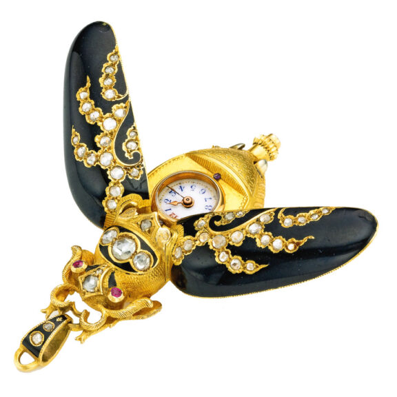 Swiss gold, enamel, and diamond set form watch Circa 1900