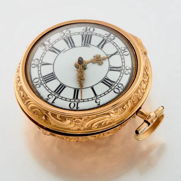 A English verge in 20 carat gold repousse pair cases Circa 1760 A English verge in 20 carat gold repousse pair cases Circa 1760