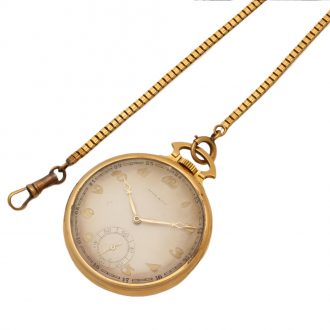Swiss gold pocket watch with matching chain Circa 1925