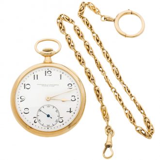 Swiss 18K gold open faced pocket watch with chain Circa 1925