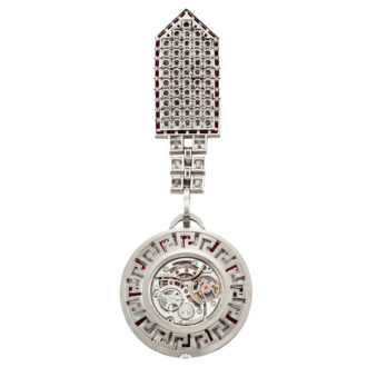 Swiss platinum, diamond and ruby set lapel watch Circa 1972