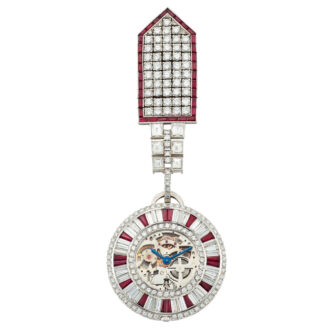 Swiss platinum, diamond and ruby set lapel watch Circa 1972