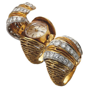 Swiss yellow gold and diamonds ring watch with concealed dial Circa 1960