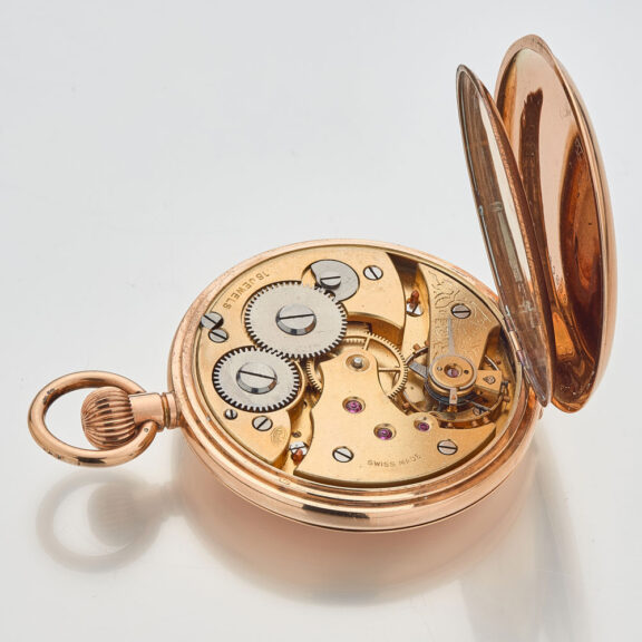 Swiss gold half hunting cased pocket watch Circa 1900 Swiss gold half hunting cased pocket watch Circa 1900