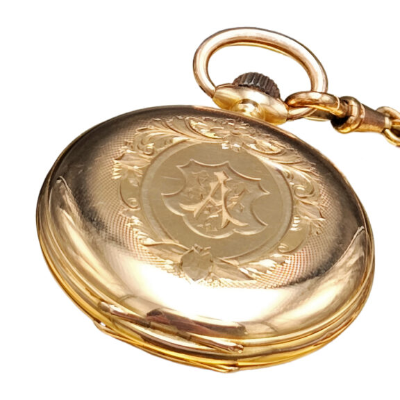 Swiss 18K gold pocket watch with matching chain Circa 1900 Swiss 18K gold pocket watch with matching chain Circa 1900