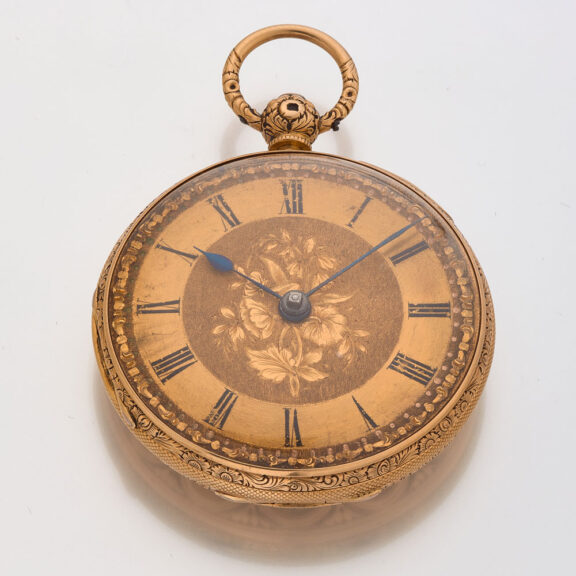 English decorative watch in a gold open faced case Circa 1840 English decorative watch in a gold open faced case Circa 1840