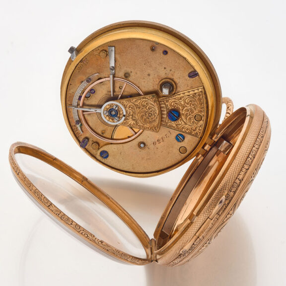 English decorative watch in a gold open faced case Circa 1840 English decorative watch in a gold open faced case Circa 1840