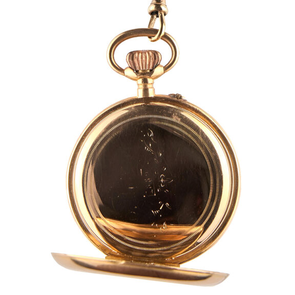 Swiss gold open faced pocket watch with chain from the 19th century Swiss gold open faced pocket watch with chain from the 19th century