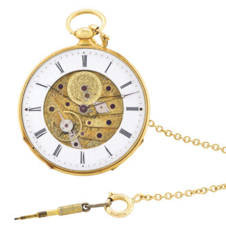 Swiss bagnolet calibre ultra thin watch with an 18 Carat gold chain and brass male key Circa 1840