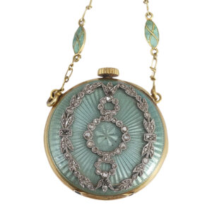 Swiss gold enamel pendant watch with matching chain Circa 1910