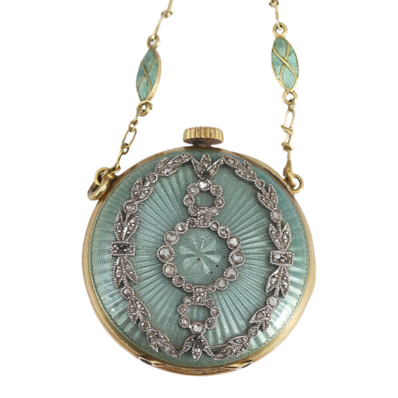 Swiss gold enamel pendant watch with matching chain Circa 1910