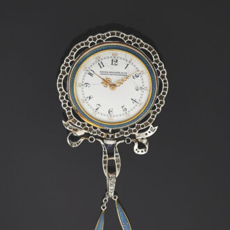 Swiss gold enamel platinum and rose cut diamond set pendant watch Circa 1900 Swiss gold enamel platinum and rose cut diamond set pendant watch Circa 1900