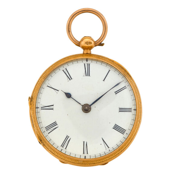 Front bezel opened by depressing the button at the gold pendant.