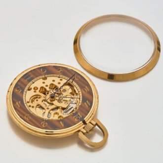 Swiss gilt watch with a skeletonized movement Circa 1970 Swiss gilt watch with a skeletonized movement Circa 1970