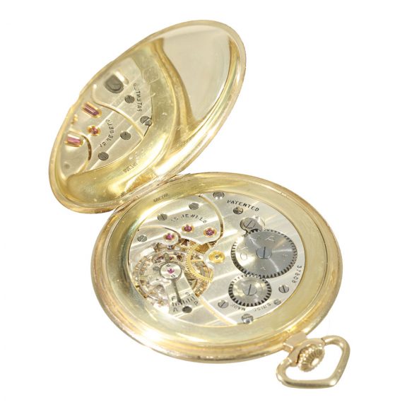 Swiss 14 carat gold Art Deco dress watch with gold chain Circa 1930 Swiss 14 carat gold Art Deco dress watch with gold chain Circa 1930