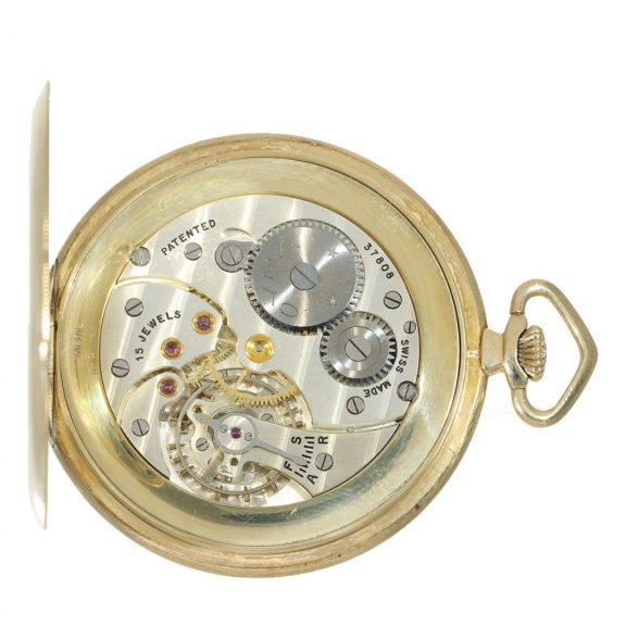 Swiss 14 carat gold Art Deco dress watch with gold chain Circa 1930 Swiss 14 carat gold Art Deco dress watch with gold chain Circa 1930
