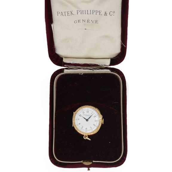 Swiss 18K gold miniature keyless lever pendant watch Circa 1900 Swiss 18K gold miniature keyless lever pendant watch Circa 1900