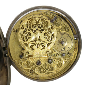 An English silver verge with repoussé decoration Circa 1740 An English silver verge with repoussé decoration Circa 1740