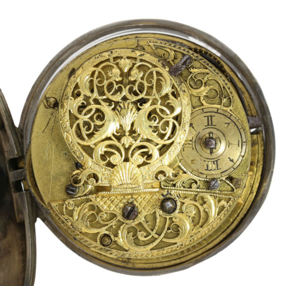 An English silver verge with repoussé decoration Circa 1740 An English silver verge with repoussé decoration Circa 1740