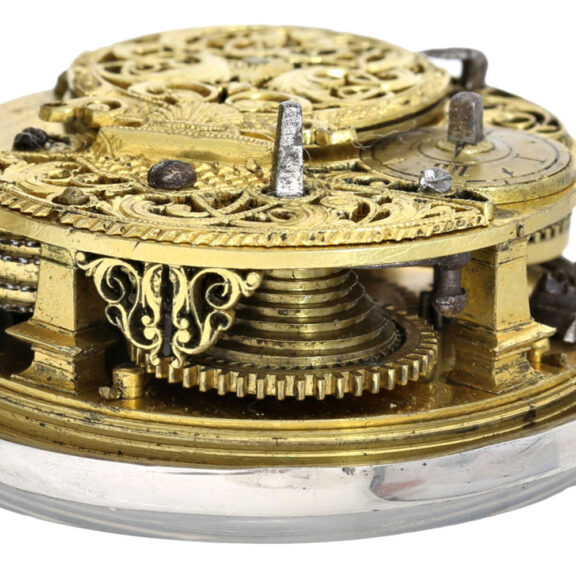 An English silver verge with repoussé decoration Circa 1740 An English silver verge with repoussé decoration Circa 1740