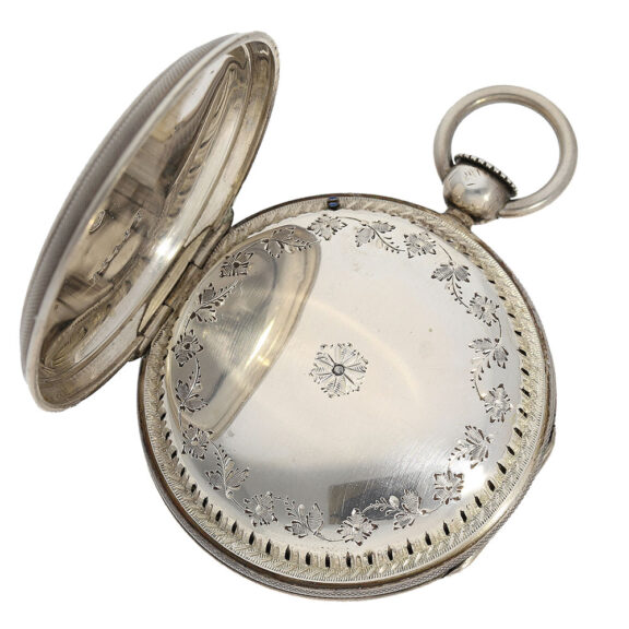 Dust cover with sound openings and floral engraving Dust cover with sound openings and floral engraving