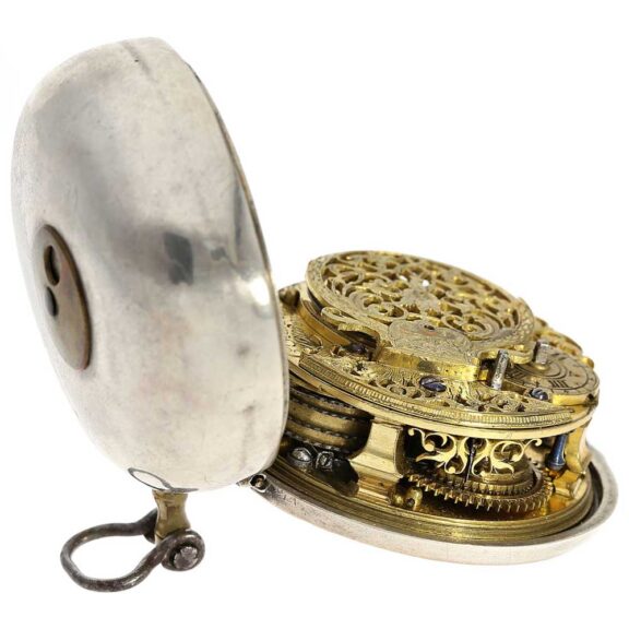 English silver pair cased verge repoussé pocket watch Circa 1730 English silver pair cased verge repoussé pocket watch Circa 1730
