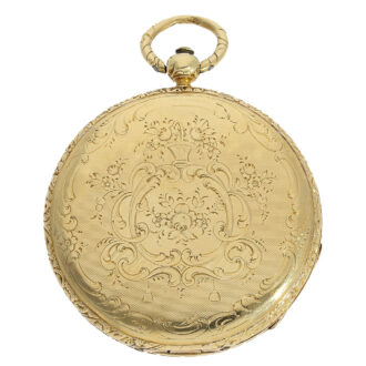 18 Carat gold case which is finely engraved on front 18 Carat gold case which is finely engraved on front