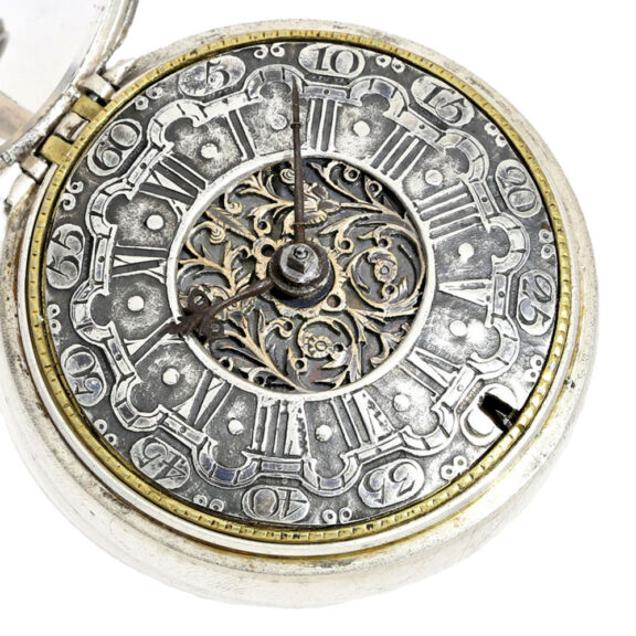 A rare metal Dutch verge with silver champlevé dial Circa 1730 A rare metal Dutch verge with silver champlevé dial Circa 1730