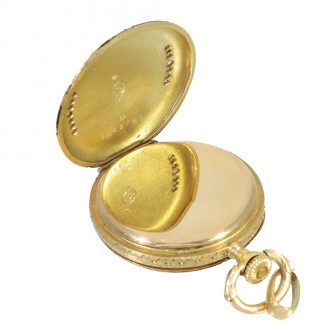 Swiss 18 carat gold pocket pendant watch with diamond trim Circa 1910