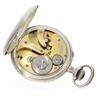 Swiss silver full hunter case watch with visible balance ‘Infini’ Circa 1920 Swiss silver full hunter case watch with visible balance ‘Infini’ Circa 1920