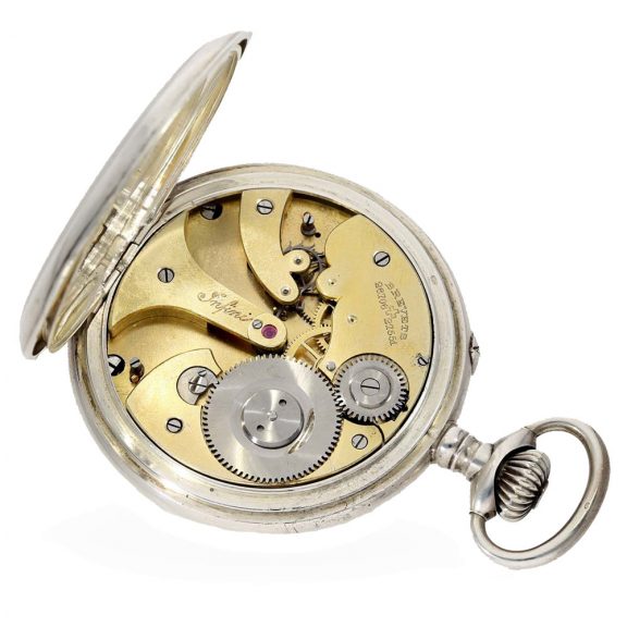 Swiss silver full hunter case watch with visible balance ‘Infini’ Circa 1920 Swiss silver full hunter case watch with visible balance ‘Infini’ Circa 1920