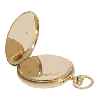 Open faced 14 Carat gold case with a signed dust cover